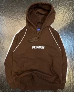 هودی رگلان pegador رنگ قهوه ای بچگانه و نوجوان