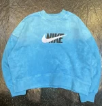 کراپ سنگشور طرح لوگوی نایک رنگ آبی یخی